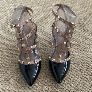 Black and tan rock stud pattern leather heels